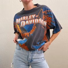 Vintage Harley-Davidson 1995 Single Stitch Eagle Front/Back Graphic Tee Vintage/Faded Black Colorway Large Bald Eagle Front Graphic Design Authentic Harley Davidson Wild Wind Bend, Or Back Graphic Size On Tag: No Size Tag. Fits Like L. Model (Me) Is A Size S/26/4 And 5’6” For Reference Condition: Great Vintage Condition. Light-Normal Wear. Some Paint/Bleach Splatter, As Pictured. Please Refer To Photos + Reach Out If You Have Any Questions Always Open To Offers Bundle To Save Follow Along Basicposhbabe On Social Media Graphic Tee Vintage, Graphic Tees Vintage, Vintage Harley Davidson, Vintage Harley, Bald Eagle, Vintage Tops, Size Tag, Bend, Harley Davidson