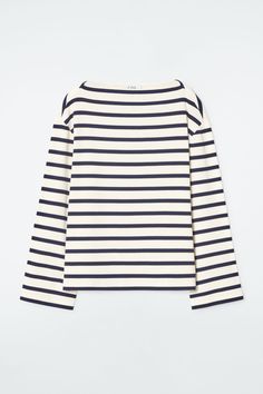 Modernizing the classic Breton tee, this top is designed with a boat neckline and long, wide sleeves. It's made from soft cotton and printed with bold red stripes that will lend a pop of color to otherwise neutral outfits. Regular fit Shell: 100% Cotton. Excluding trims / Machine wash Back length of size S is 23.74" / Model wears a size S Neutral Long Sleeve Shirt, French Summer Style, Europe Fits, Breton Shirt, Neutral Shirt, Grey Striped Shirt, Striped Tops, Neutral Outfits, Breton Stripes