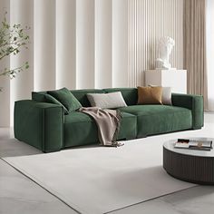 a living room with a large green couch