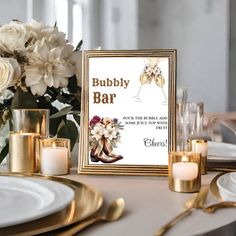 a table set for a wedding with candles and flowers