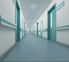 an empty hospital hallway with blue and white walls