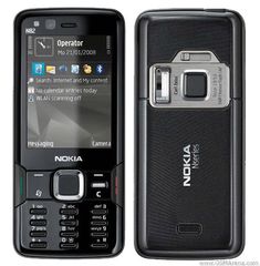 an old nokia cell phone is open and showing the new logo on its display screen