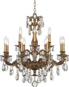 an antique chandelier with crystal drops