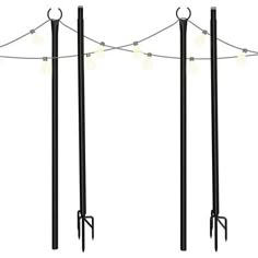 three black poles with lights on them and one pole has two long poles attached to it