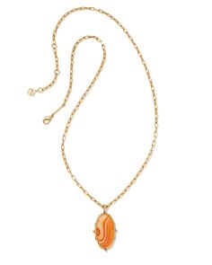 An icon, framed by heritage detailing inspired by traditional kilim motifs. The Baroque Ella Vintage Gold Long Pendant Necklace in Orange Banded Agate is a trend-forward design that makes a bold statement. 

 This necklace is a part of Yellow Rose by Kendra Scott—a collection that celebrates the American Southwest with Kendra Scott staples alongside select curated jewelry pieces and accessories. Kilim Motifs, Sold Out Sign, Traditional Kilim, American Southwest, Long Pendant Necklace, Banded Agate, Long Pendant, Brass Material, Gold Fashion