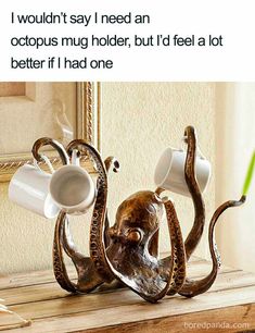 an octopus coffee cup holder with two cups in it's mouth and the caption says, i wouldn't say i need an octopus mug holder but i