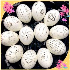 a basket filled with lots of white eggs