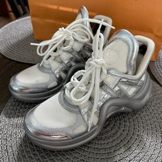 Louis Vuitton Size 7 Sneakers Authentic With No Box. Runs A Little Small I Am Usually A True 6 But 7 Fit Perfect In Me Clean No Stains Only The Sole But In Perfect Condition Looks Like New. Offers Are Welcome Louis Vuitton Shoes, Womens Shoes Sneakers, Like New, Shoes Sneakers, Louis Vuitton, Running, Women Shoes, Sneakers