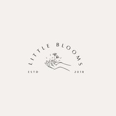 the logo for little bloom's is shown in black and white, with a hand holding