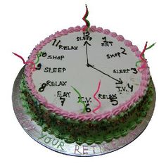 a birthday cake with a clock on the top and writing on the side that says sleep