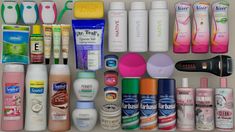 an assortment of different types and sizes of hair care products in a drawer with labels on them