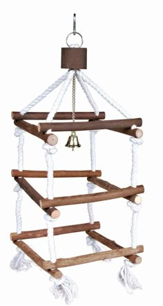 a wooden and rope wind chime with bells hanging from it