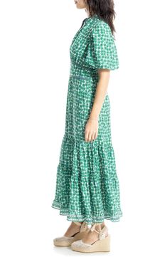 Ditsy florals punctuate throughout this maxi dress designed in a tiered silhouette. 52" length Deep V-neck Elbow-length sleeves Unlined 100% polyester Machine wash, line dry Imported Model stats: 5'10" height, 32" bust, 25" waist, 36" hip. Model is wearing size Small. Poppies Field, Maxi Dress Designs, Max Studio Dress, Poppy Field, Tiered Maxi Dress, Green Cream, Max Studio, Elbow Length Sleeve, Deep V Neck