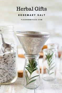 herbs and salt in glass jars with spoons