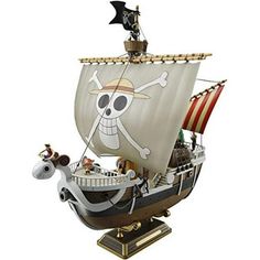 a toy pirate ship with a white horse and black flag on it's side