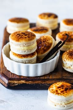 there are many small desserts on the tray