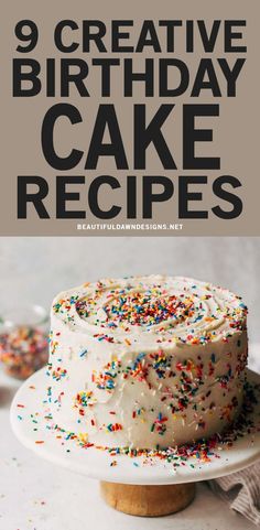 a cake with white frosting and sprinkles on it