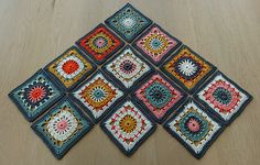 four granny granny granny squares are arranged on the floor