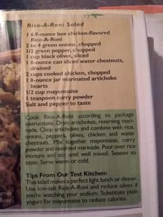 an open recipe book with instructions on how to make rice - rich chicken salad in it