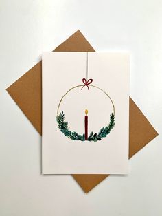 Christmas is just around the corner - so it's high time to stock up on Christmas cards! Whether you give it as a gift, send it or keep it for yourself, the card will definitely conjure up a bit of Christmas spirit in any room 🎄. I painted the card myself with acrylic paint, digitized it and then printed it. The format is in the classic postcard format (DinA6) and is made of 0.39 mm natural cardboard 300g. The back is matt and can be written on. The card can optionally be ordered with an envelop Christmas Card Candle, Christmas Cards Painting Ideas, Christmas Cards Painted Acrylic, Happy Holidays Cards Diy, Christmas Cards Diy Handmade Easy, Paint Your Own Christmas Cards, Christmas Postcards Ideas, Hand Painted Holiday Cards