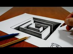 someone is drawing something in the shape of a square and rectangle with pencils