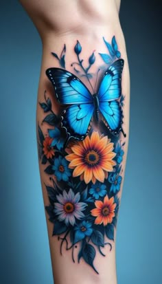 a woman's leg with flowers and a butterfly on it