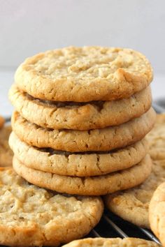 a stack of cookies sitting on top of a cooling rack