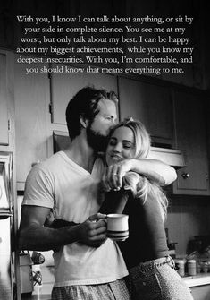 a man and woman hugging each other in the kitchen with text overlaying them