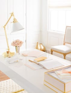 a desk with an office chair, lamp and books on it that says your office just got a promotion