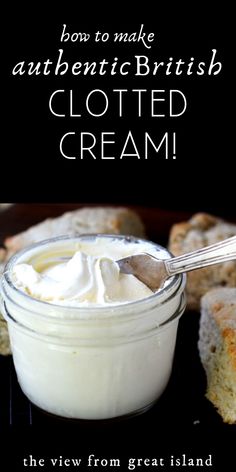 a jar of cream sitting on top of a table next to some slices of bread