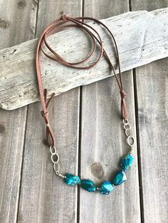 Boho Chic Leather & Chrysocolla Necklace. Leather and Gold. - Etsy Adjustable Artisan Turquoise Necklace, Rustic Adjustable Turquoise Necklace, Adjustable Rustic Turquoise Necklace, Adjustable Turquoise Necklace For Festivals, Rustic Adjustable Leather Necklace, Adjustable Rustic Leather Necklace, Handmade Rustic Adjustable Turquoise Necklace, Artisan Brown Turquoise Necklace For Jewelry Making, Adjustable Turquoise Necklace With Patina