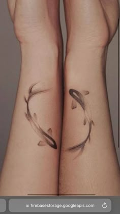 two people with matching tattoos on their arms