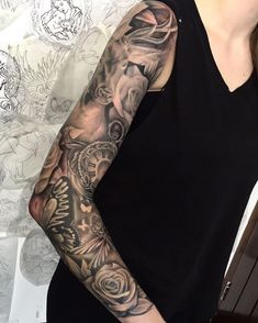 a woman with a tattoo on her arm