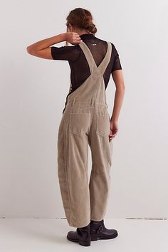 Our top-rated Good Luck Overalls — now in a textured corduroy fabrication! Featuring the signature barrel-leg fit, you’ll reach for this pair all season long. **Fit:** Bib-and-brace design with wide barrel-leg **Features:** Front bib pocket, tapered knee design, adjustable brace straps, side button detailing, soft cord fabrication **Why We ❤ It:** Toughened-up with moto boots or laid-back with sporty sneakers, this pair has endless ways to wear. | We The Free Good Luck Cord Overalls at Free People in Green, Size: XL Carhartt Overalls Women, Cord Overalls, Leather Overalls, Work Overalls, Corduroy Dungarees, Carhartt Overalls, Overalls Vintage, Overalls Fashion, Chamber Music