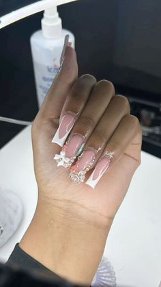 French Tip Acrylic Nails Charms, Acrylic Nails With Bow Charms, Medium Acrylic Nails With Charms, French Tip Charm Nails, Freestyle French Tip Nails, Acrylic Nails French Tip With Design, Nails With Glitter French Tip, French Tip Charms, French Tip Bow Nails