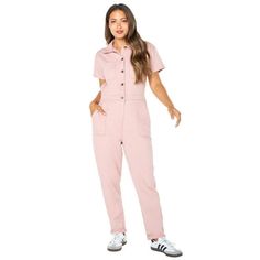 One piece dressing at it's finest! Celebrity Pinks Juniors Short Sleeve Boilersuit in soft stretch twill is the perfect blend of comfort, style and function all in one. This relaxed fit denim boilersuit has an elastic waist for flexible and comfortable fit, while the front button detail and porkchop pockets add a stylish touch. A versatile and trendy piece that could be dressed up or down for various occasions. Size: L.  Color: Pink.  Gender: female.  Age Group: adult. Plus Size Denim Jumpsuit, Piece Dressing, Chambray Jumpsuit, 50th Clothing, Boiler Suit, Pink Jumpsuit, Celebrity Pink, Jumpsuit With Sleeves, Pink Outfits