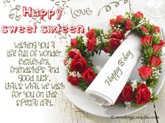 a white plate topped with red roses on top of a wooden table next to a happy valentine's day message