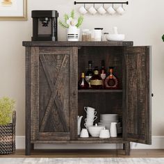 a wooden cabinet with dishes and cups on it