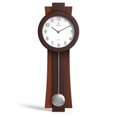 a clock that is on the side of a wooden pole with a silver ball in front of it