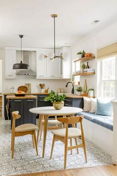 the kitchen is clean and ready to be used as a breakfast nook or seating area