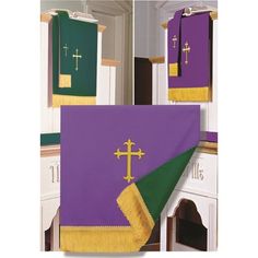 the altar cloths are purple, green and gold with crosses on them in different colors