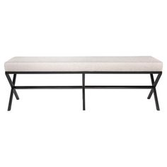 a bench that is sitting on top of a white surface with black legs and a seat cushion