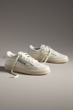 Leather upper Textile insole Rubber sole Tie styling Imported | Club C 85 Vintage Sneakers by Reebok in White, Women's, Size: 6, Leather/Rubber at Anthropologie Reebok Club C 85 Outfit Women, Reebok Club C 85 Outfit, Club C 85 Outfit, Walking Sneakers For Women, Reebok Club C 85 Vintage, Tie Styling, Club C 85 Vintage, Sneakers Reebok, Reebok Club C 85