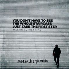 a person walking up some stairs with a quote on the wall behind them that says, you don't have to see the whole staircase just take the first step