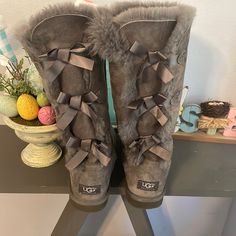 Gray Uggs With Bows On The Back Size 9 Like New Condition Gray Uggs, Grey Uggs, Uggs With Bows, Womens Uggs, Ugg Shoes, The Back, Bootie Boots, Ankle Boots, Like New