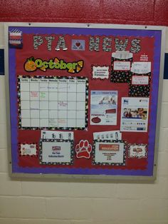 a bulletin board with pictures and writing on it in a school gym room or classroom