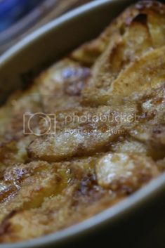 a casserole dish filled with food sitting on top of a table