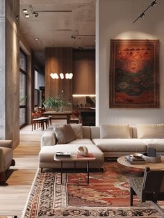 a living room filled with furniture and a painting on the wall