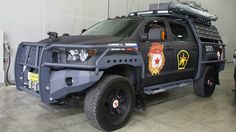 an armored police vehicle parked in a garage