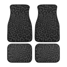 four black leopard print floor mats